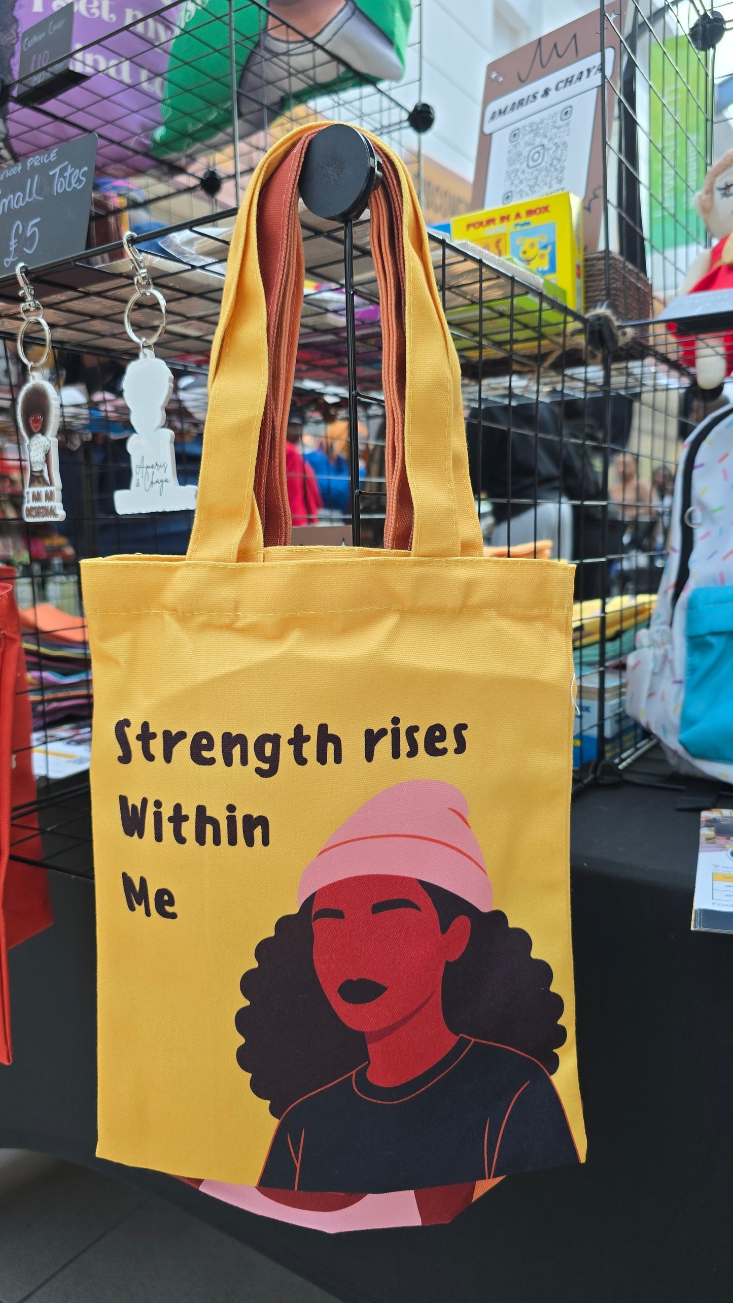 Strength Rises Within Her Tote Bag